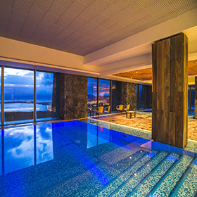 Swimming pool area at night, Hotel Arakur Ushuaia Resort and Spa, Ushuaia, Tierra del Fuego, Patagonia, Argentina